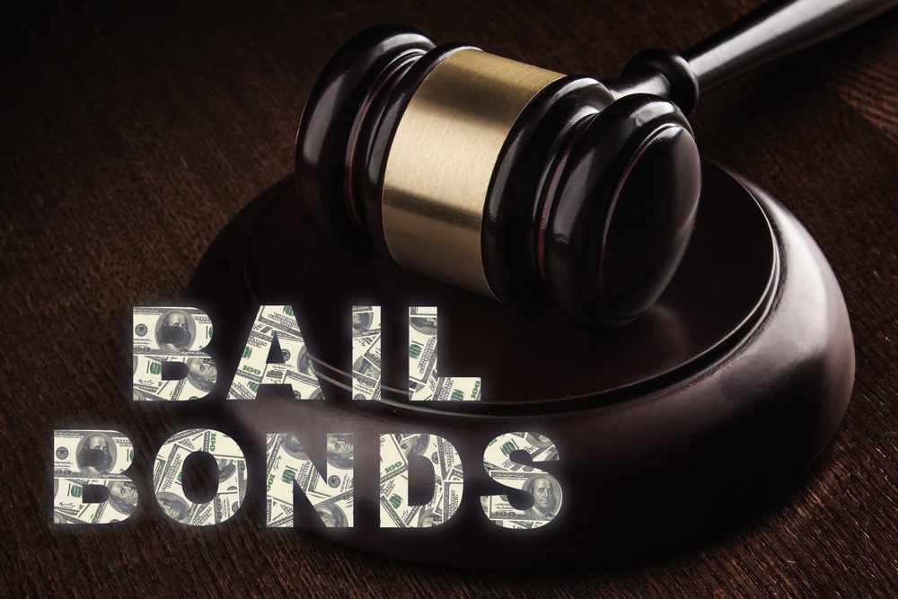 gavel on a court bench with words bail bonds