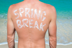 person with sunscreen on back