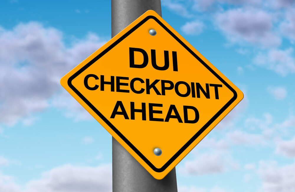 sign that says DUI checkpoint ahead