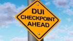 sign that says DUI checkpoint ahead