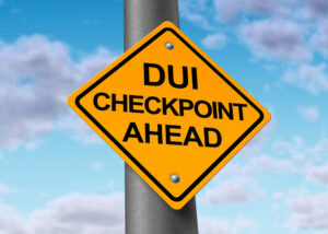 sign that says DUI checkpoint ahead